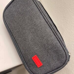 Gray Travel Pouch with Red Accent